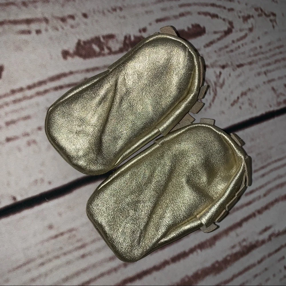 Gold moccasins 6-12 months